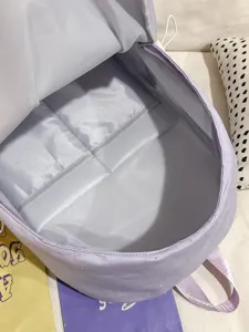 Light purple polka dot mini backpack for women, sweet Japanese school style student bag.