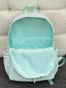Mint green kids backpack with star pattern, featuring thickened compartment and pockets.