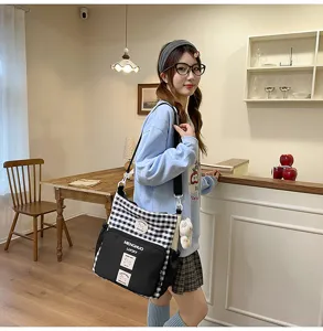 Student campus plaid crossbody canvas bag, stylish color-block large capacity shoulder bag.