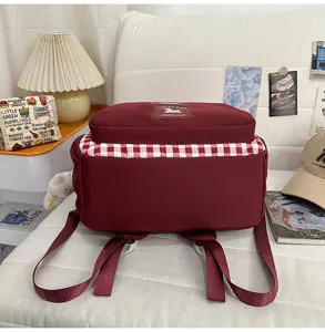 Japanese style sweet plaid backpack, large capacity school bag for students stylish design.