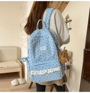 Korean ins-style corduroy backpack for women, cute bow pattern school bag with cute bear pendant.