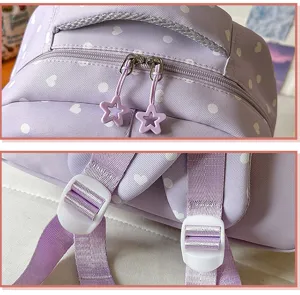 Sac à dos d'école violet clair à pois avec curseurs étoile et bretelles réglables pour filles.
