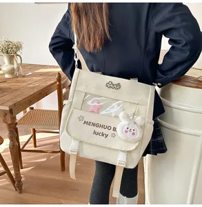 Sac de toile pour étudiant avec poche transparente et joli pendentif lapin peluche.