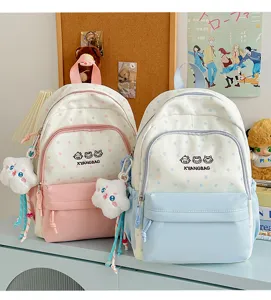 Mochila escolar bonita en bloque de color con patrón de estrellas para viajes de chicas.
