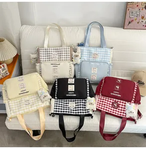Cute plaid canvas tote bag with plush bear pendant, casual student shoulder bag for daily use.