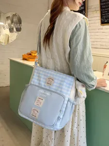 Student campus canvas crossbody bag, stylish color-block design with large capacity for daily use.