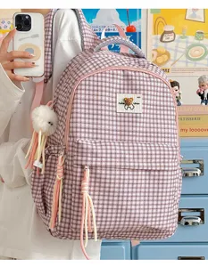 Sweet pink plaid backpack for girls, cute Japanese style school bag with plush pendant.