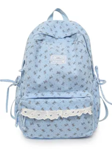 Cute blue corduroy backpack for girls with sweet bow prints and lace trim, stylish school bag.