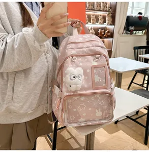 Cute pink star backpack with clear front pocket, multi-compartment casual school bag for girls.
