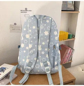 Cute blue star print backpack with multiple compartments for student daily use style.