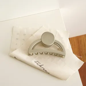 Minimalist matte half-moon hair claw clip for elegant daily hairstyles, large strong grip.