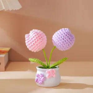 Handmade crochet flower potted plant detail view, perfect cute desk decor and lovely gift.