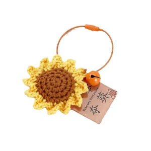 Handmade crochet sunflower keychain with cute bell pendant, perfect student school bag accessory gift.
