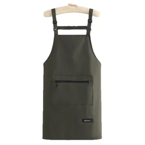Waterproof canvas kitchen apron with adjustable straps and zipper pocket for daily cooking.