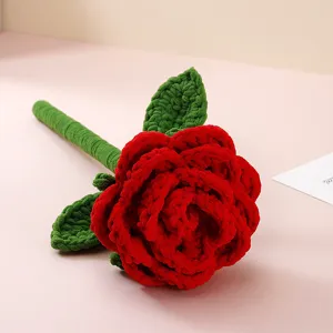 Handmade crochet red rose flower detail, exquisite yarn knitting for gift and decor.