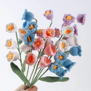 Handmade crochet lily of the valley bouquet, colorful knitted artificial flowers for home decor.