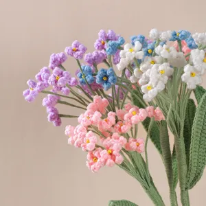 Handmade crochet baby breath flower bouquet detail view, exquisite knit floral decor.