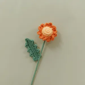 Handmade crochet daisy flower stem detail, cute knitted floral decor for gifts and home.