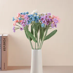 Handcrafted crochet flower bouquet knitted forget me nots in vase for home decor gift.