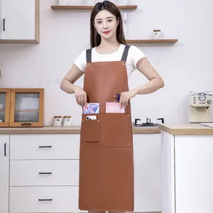 Waterproof PU leather kitchen apron detail view, long design for oil-proof cooking work.