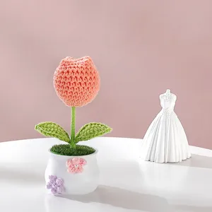 Handmade crochet tulip potted plant detail, cute knitted floral decor for desk and car.