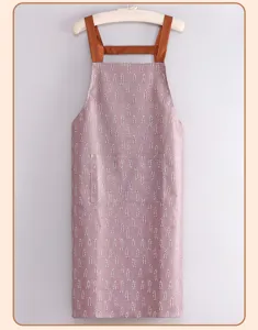 Grembiule da cucina impermeabile con motivo a foglie, tasche anteriori e spallacci.