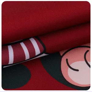 Waterproof kitchen apron fabric detail with cute cartoon print and durable canvas weave.