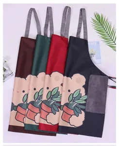 Waterproof kitchen apron with cute bear pattern, oil-resistant cooking work apparel.