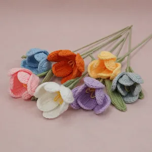 Handmade crochet tulip flower detail showing neat yarn stitches and vibrant multi-color petal design.