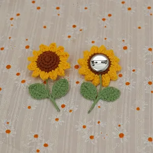Handmade crochet sunflower brooch detailed view, lovely floral accessory for daily wear.