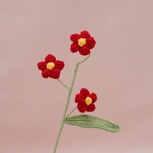 Handmade crochet flower branch detail, delicate puff floral design for home decoration.