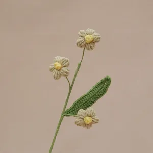 Handcrafted crochet puff flower branch, knit floral decor piece for aesthetic room interior.