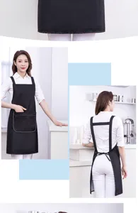 Black waterproof apron detail view showing front back and zippered pocket for kitchen cooking.