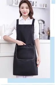 Waterproof kitchen apron for women, black work apron with zipper pocket and stylish design.