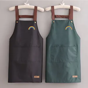 Delantal de cocina impermeable con bolsillos y estampado de arcoíris para cocinar en casa.
