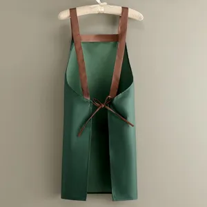 Delantal de cocina impermeable verde oscuro con tirantes cruzados marrones para restaurantes