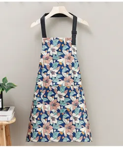 Floral kitchen apron for adults with adjustable black straps, waterproof cooking workwear.