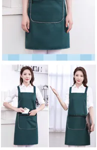 Waterproof kitchen apron for women with zipper pocket, stylish dark green workwear design.