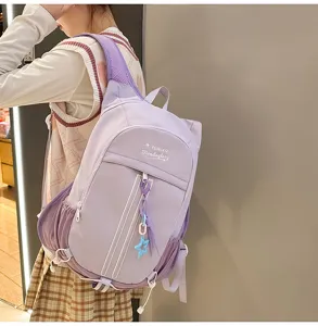 Candy color purple backpack detail shot, showing stylish design and wearing effect on model.