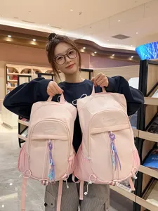 Candy color gorpcore backpack for women and men, stylish large capacity travel school bag.