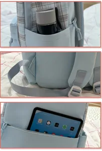 Vista detallada de mochila de estudiante a cuadros azul claro con bolsillo lateral y compartimento.