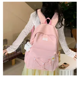 Candy colored student backpack detail view, cute style daily school bag with front pockets.