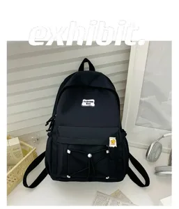 Korean style student schoolbag black casual backpack with front pocket and fashion label