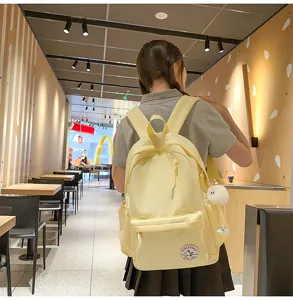 Korean style canvas school backpack for teenage girls cute casual light yellow book bag.