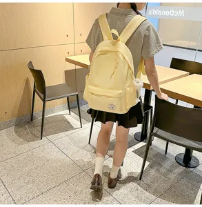 Korean style minimalist canvas school backpack for students, casual daily light daypack