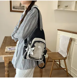 Chic colorblock chest bag with clear pocket and star pendant, trendy casual backpack for daily use.