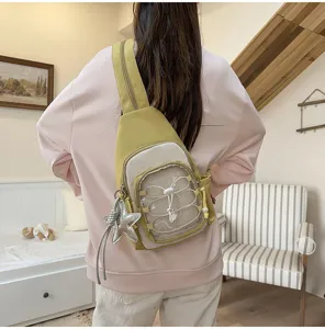 Low-saturation color block chest bag for women, cute casual backpack with clear front pocket.