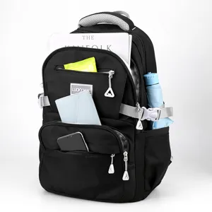 Zaino scolastico nero impermeabile, borsa da viaggio capiente con tasche multiple.