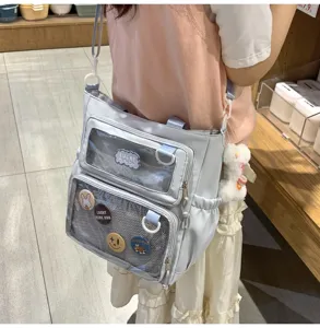 Japanese style versatile shoulder crossbody ita bag with clear window and cute badges for daily use.