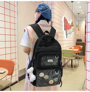 Casual large capacity black canvas backpack with clear front pocket for women and students.